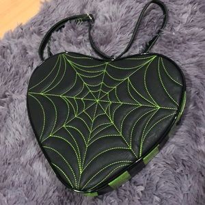 Love pain and stitches green glitter backpack